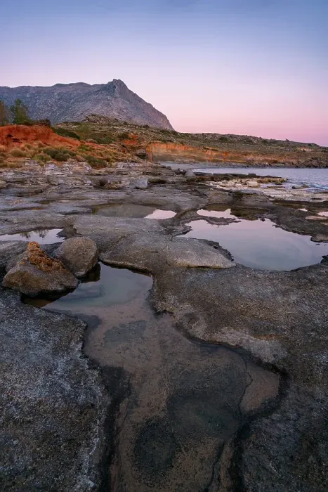 Framed Print : Aspes beach, natural holes in the rocks full of water at sunset, with sea in the background, Greece Framed Print : Aspes beach, natural holes in the rocks full of water at sunset, with sea in the background, Greece
