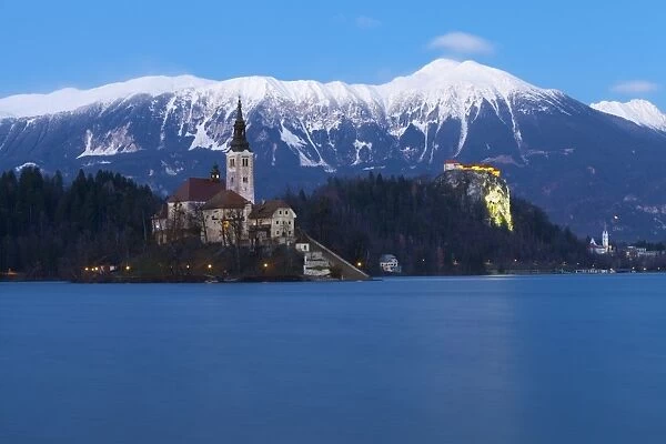 The Assumption of Mary Pilgrimage Church on Lake Bled and Bled Castle at Dusk, Bled