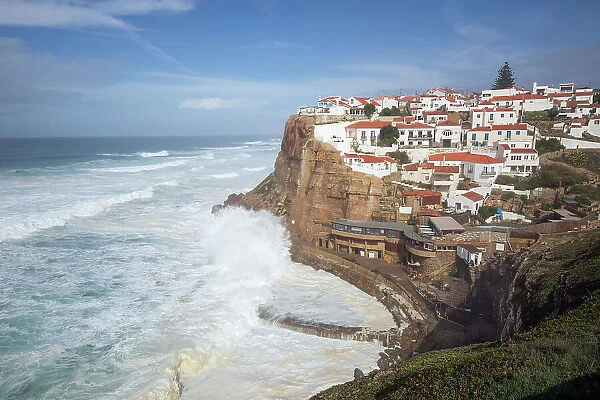 Atlantic Ocean waves breaking below cliffs of Azenhas do Mar on the west coast, Azenhas do Mar, Lisbon Region, Portugal, Europe