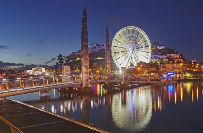 Framed Print : An atmospheric dusk view across Torquay Marina to the town of Torquay Framed Print : An atmospheric dusk view across Torquay Marina to the town of Torquay
