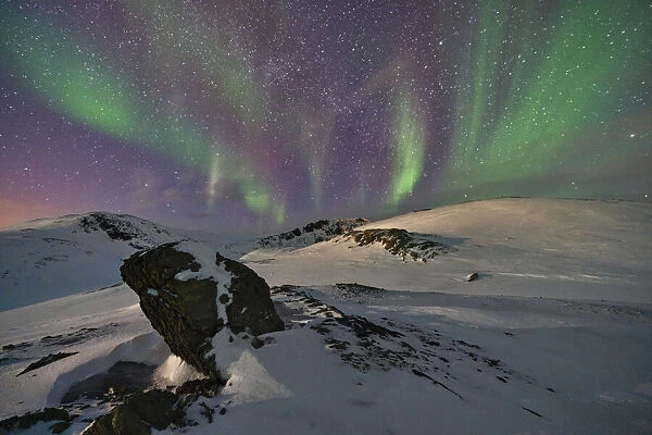Aurora Borealis (Northern Lights) over the mountains, Finnmark, Norway, Scandinavia