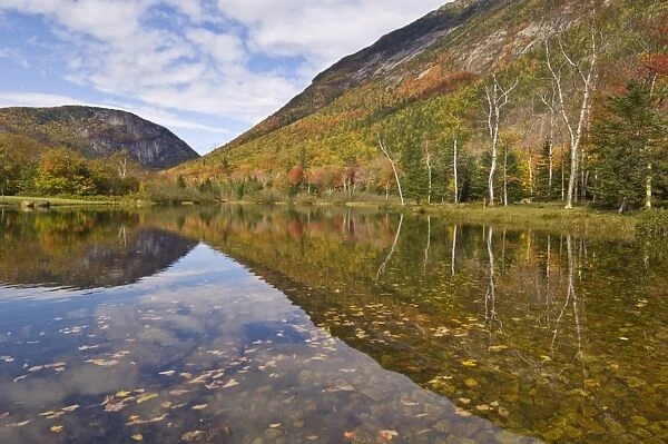 Autumn colours reflected in the Willey Pond, Crawford Notch State Park route 302