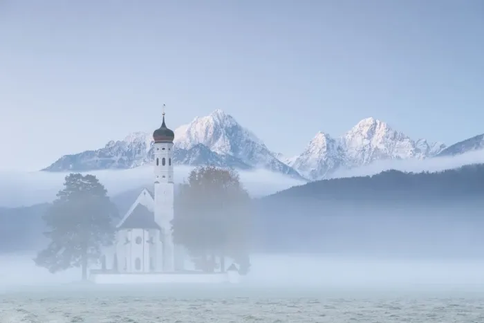 Framed Print : The autumn fog at sunrise frames St. Coloman Church surrounded by snowy peaks, Schwangau