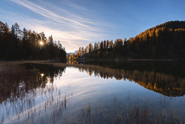 Autumn sunrise at Lake Malghette, Val Rendena, Trentino Alto Adige, Italy