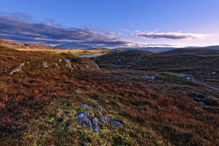 Framed Print : Autumn view of colorful grasses and rocks and misty mountains in the moors of Framed Print : Autumn view of colorful grasses and rocks and misty mountains in the moors of