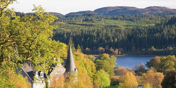 Autumn view to Loch Achray from wooded hillside above the former Trossachs Hotel