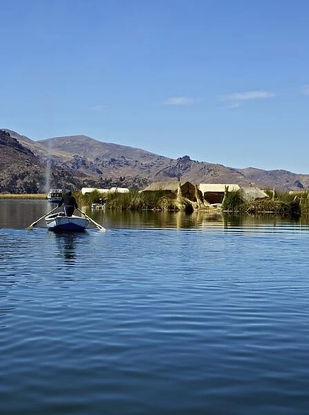 Aymara man in a boat, Lake Titicaca, Flotantes, peru, peruvian, south america, south american, latin america, latin american South America