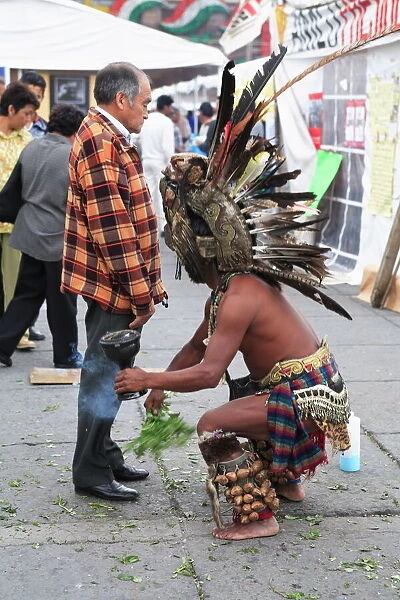 Aztec folk healer, shaman practising spiritual cleansing, Zocalo, Plaza de la Constitucion