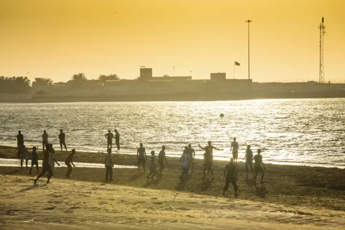 Framed Print : Backlight at men playing soccer at the beach of Bukha, Musandam, Oman, Middle East Framed Print : Backlight at men playing soccer at the beach of Bukha, Musandam, Oman, Middle East