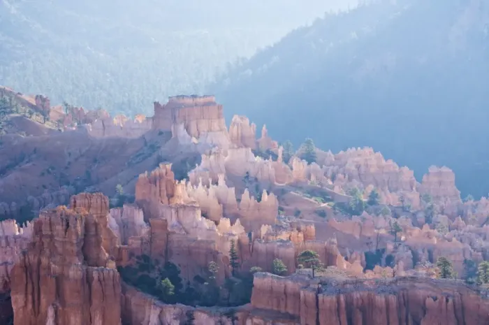 Framed Print : Backlit sandstone hoodoos in Bryce Amphitheater, Bryce Canyon National Park