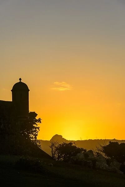 Backlit watchtower of the Fortress of Fortaleza San Felipe, Puerto Plata, Dominican Republic, West Indies, Caribbean, Central America