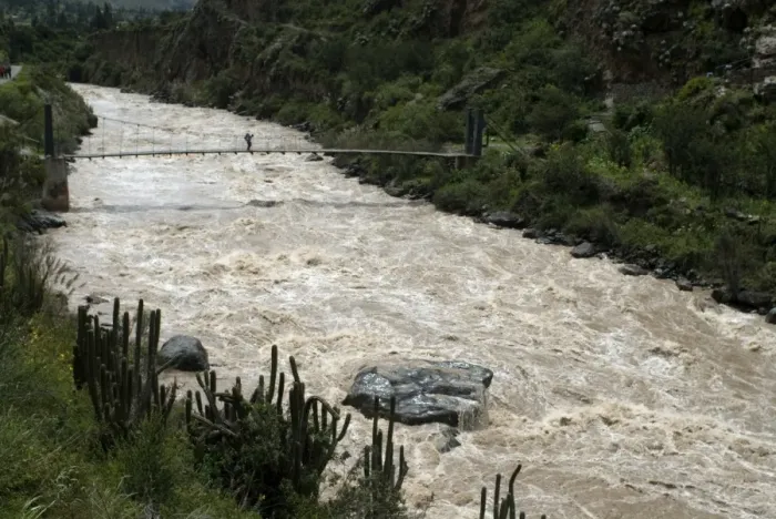 Framed Print : Backpacker crosses bridge over Urubamba River, on the Inca Trail, Peru, South America Framed Print : Backpacker crosses bridge over Urubamba River, on the Inca Trail, Peru, South America