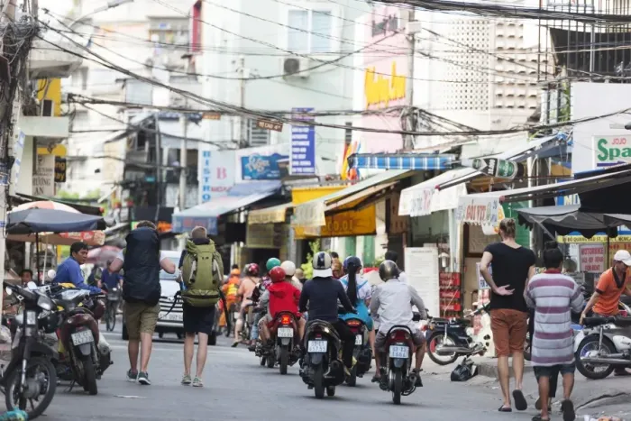 Framed Print : Backpackers on city street, Ho Chi Minh City (Saigon), Vietnam, Indochina, Southeast Asia Framed Print : Backpackers on city street, Ho Chi Minh City (Saigon), Vietnam, Indochina, Southeast Asia