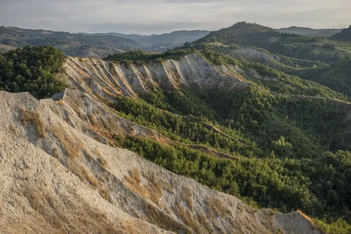 Framed Print : Badlands amphitheater with lush hills, Emilia Romagna, Italy, Europe Framed Print : Badlands amphitheater with lush hills, Emilia Romagna, Italy, Europe