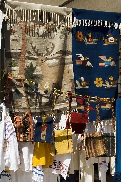 Bags and rugs for sale on market day