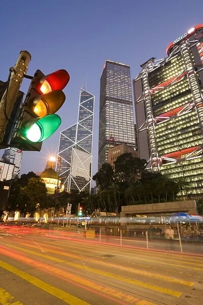 Bank of China and Hong Kong and Shanghai Bank illuminated at dusk, Statue Square in the financial district of Central, Hong Kong Island, Hong Kong