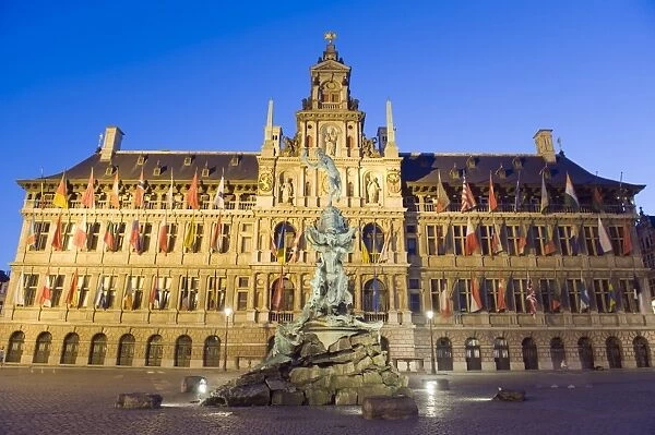 Baroque Brabo fountain, built in 1887, by Jef Lambeaux, Stadhuis (city hall) illuminated at night