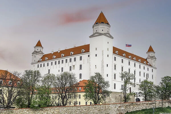 Baroque Bratislava Castle (Bratislavsky hrad) with flag flying, Bratislava, Slovakia, Europe