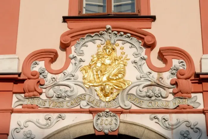 Framed Print : Detail of Baroque decoration on facade of building at Kral Jiri z Podebrad Square in town of Cheb