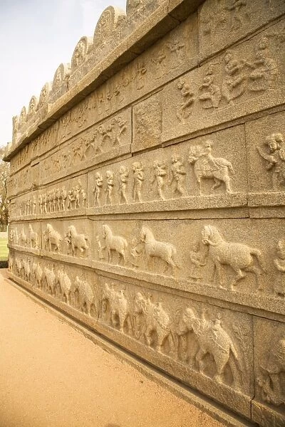 Bas relief scenes from life in the Vijayanagar Empire on the Mahanavami Dibba within the royal enclosure at Hampi, UNESCO World Heritage Site, Karnataka