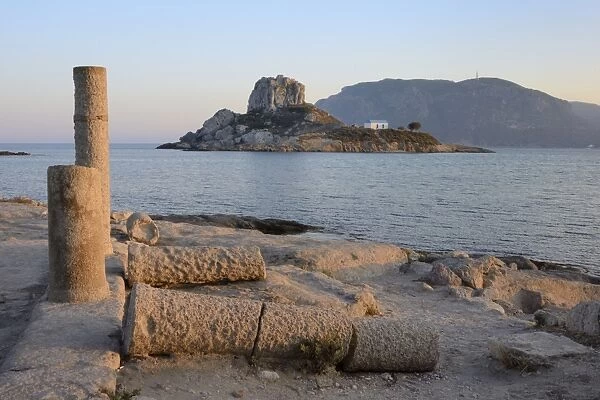 Basilica of Agios Stefanos ruins with Kastri islet and Chapel of St