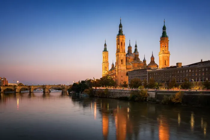 Framed Print : Basilica del Pilar Cathedral with stone bridge crossing Ebro River at sunset, Zaragoza, Aragon, Spain, Europe Framed Print : Basilica del Pilar Cathedral with stone bridge crossing Ebro River at sunset, Zaragoza, Aragon, Spain, Europe