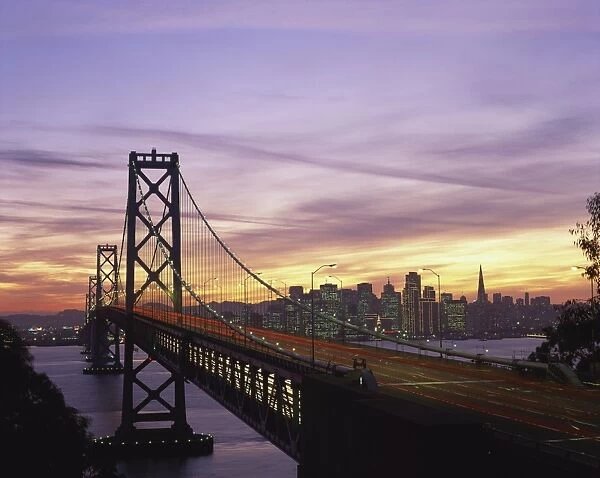 The Bay Bridge, and city skyline in the background, San Francisco, California