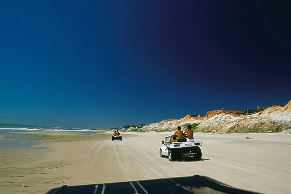 Beach buggies running on the Ceara coastline, ner Canoa Quedrada, Ceara