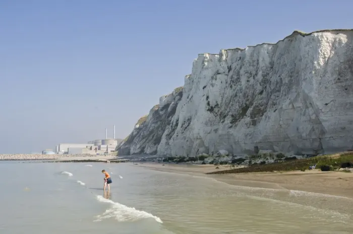 Framed Print : A beach under the chalk cliffs, mother and child paddling, Nuclear Power Station in the background Framed Print : A beach under the chalk cliffs, mother and child paddling, Nuclear Power Station in the background
