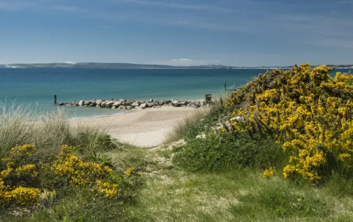 Framed Print : Beach between Hengistbury Head and Bournemouth with Poole Bay and Isle of Purbeck in the background Framed Print : Beach between Hengistbury Head and Bournemouth with Poole Bay and Isle of Purbeck in the background