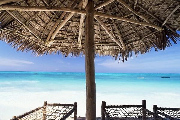 Beach parasol overlooking Indian Ocean, Jambiani beach, island of Zanzibar