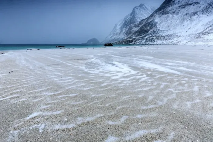 Framed Print : Beach partially snowy surrounded by mountains, Haukland, Lofoten Islands, Northern Norway