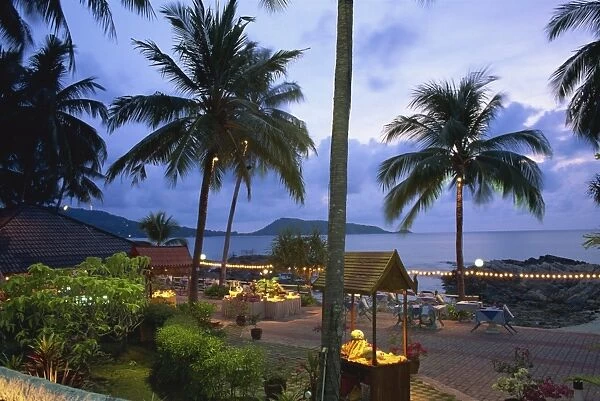 Beach restaurant at dusk, Patong, Phuket, Thailand, Southeast Asia, Asia