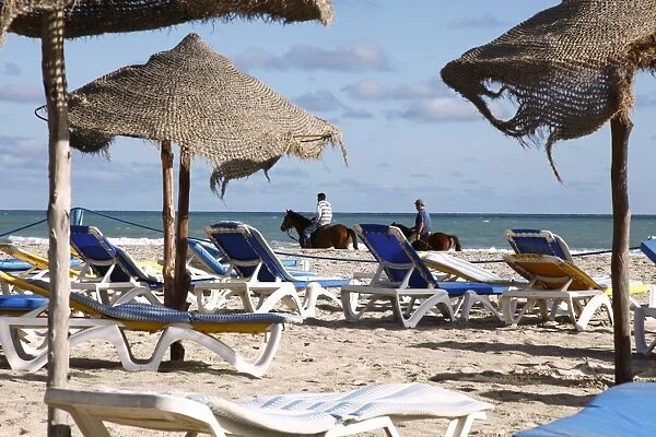 Beach scene on the Mediterranean coast in the tourist zone, Djerba Island