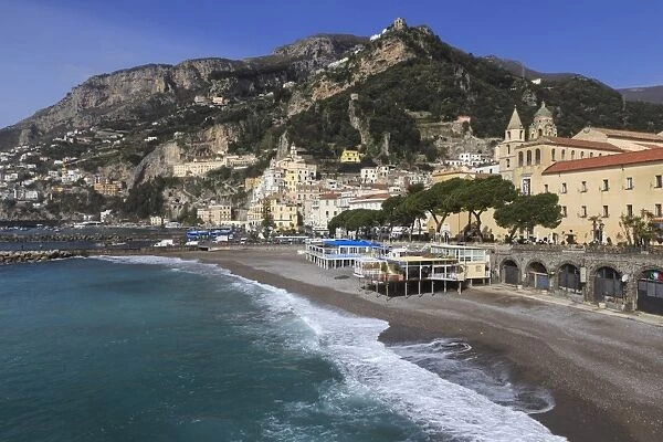 Beach, town and hills of Amalfi in sunshine with breaking waves, Costiera Amalfitana (Amalfi Coast)