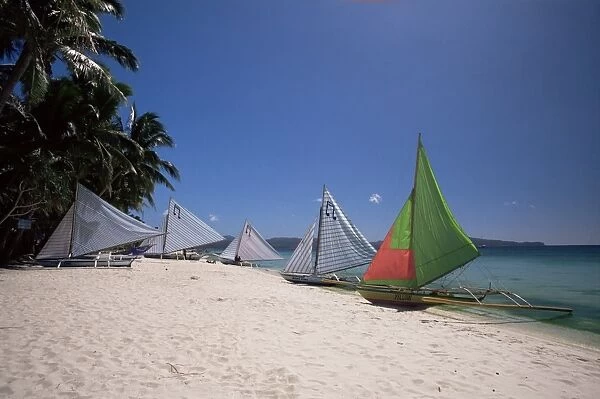 Beach on west coast of holiday island off the coast of Panay