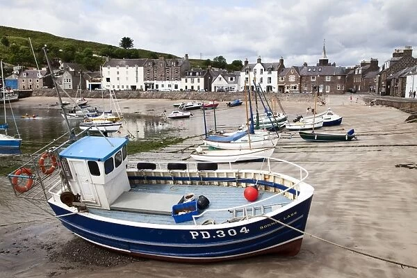 Beached fishing boat in the Harbour at Stonehaven, Aberdeenshire, Scotland, United Kingdom, Europe
