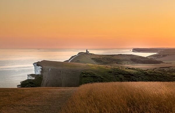 Beachy Head and the Belle Tout lighthouse at dusk, near Eastbourne, East Sussex, England, United Kingdom, Europe