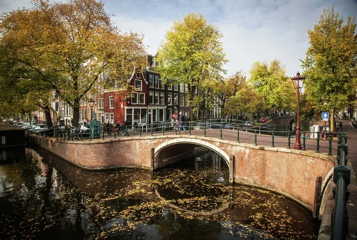 Framed Print : Beautiful canals and traditional Dutch buildings in Amsterdam, North Holland, The Netherlands Framed Print : Beautiful canals and traditional Dutch buildings in Amsterdam, North Holland, The Netherlands