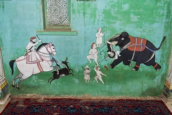 Beautiful frescoes on walls of the Juna Mahal Fort