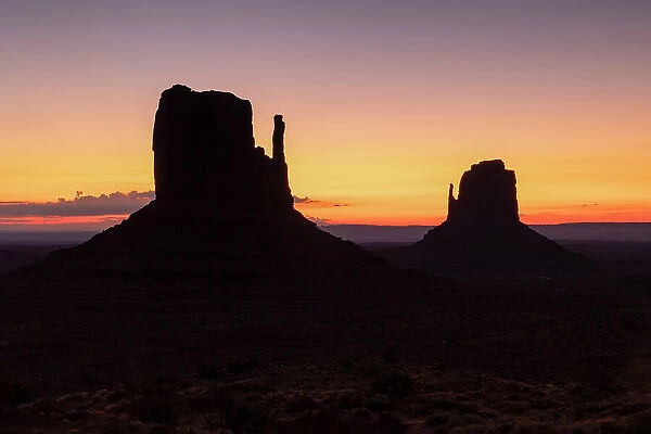Beautiful light envelops Monument Valley during a summer sunrise, Arizona, United States of America, North America