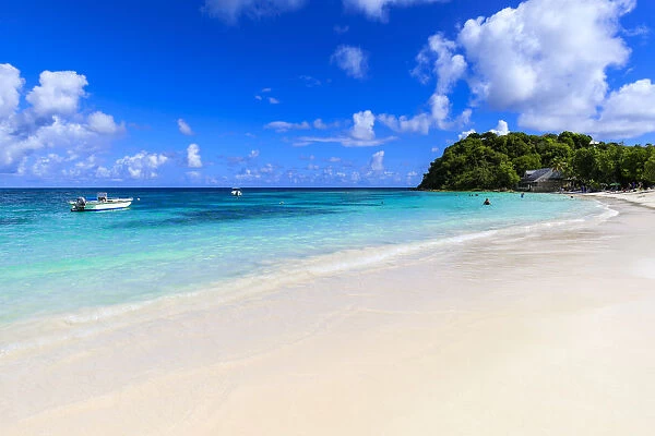 Beautiful Long Bay Beach, boat, turquoise sea, white sand, Antigua, Antigua and Barbuda