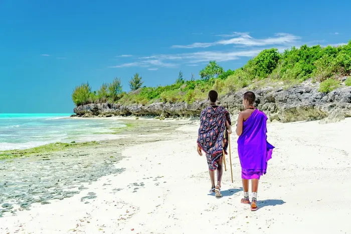 Framed Print : Beautiful Maasai woman with man walking on empty beach, Zanzibar, Tanzania, East Africa, Africa Framed Print : Beautiful Maasai woman with man walking on empty beach, Zanzibar, Tanzania, East Africa, Africa