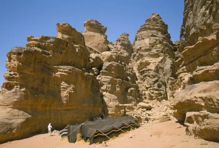 Framed Print : Bedouin tent and rocks of the desert