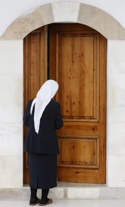 Framed Print : Bektachi woman opening the door of a turbe (shrine with saints tombs) Framed Print : Bektachi woman opening the door of a turbe (shrine with saints tombs)