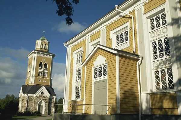 Bell tower and the worlds largest wooden church, dating from 1848