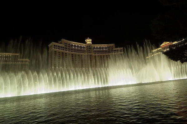 The Bellagio Hotel at night with its famous fountains