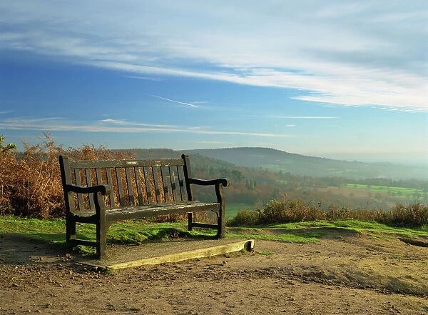 Bench on Pitch Hill, with view along the Greensand Ridge to Holmbury Hill and Leith Hill