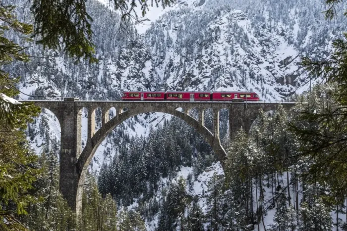 Framed Print : The Bernina Express crossing the Wiesen Viaduct in the Canton of Graubunden, Switzerland, Europe Framed Print : The Bernina Express crossing the Wiesen Viaduct in the Canton of Graubunden, Switzerland, Europe
