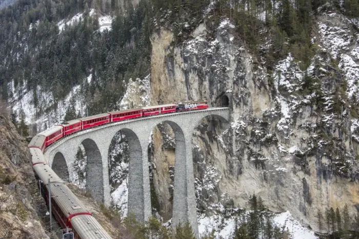 Framed Print : Bernina Express passes over Landwasser Viaduct, UNESCO World Heritage Site, and snowy woods Framed Print : Bernina Express passes over Landwasser Viaduct, UNESCO World Heritage Site, and snowy woods